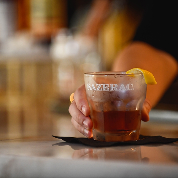 a sazerac cocktail being served